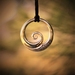 Solid bronze Wave Pendant ~koru design