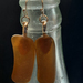 Long amber coloured beachglass earrings 