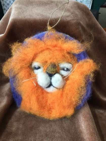 Introducing the enchanting lion needle felted painting