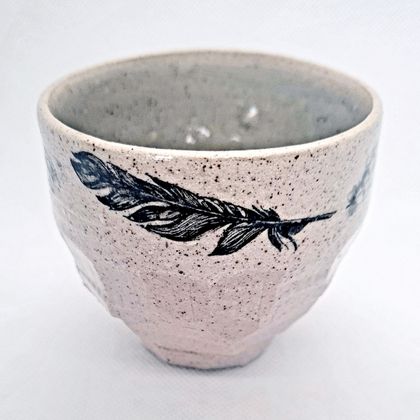 Pottery faceted feather cup