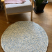 White rug speckled with blue