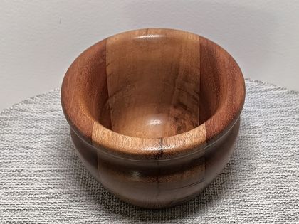 A wooden copy of a stoneware bowl