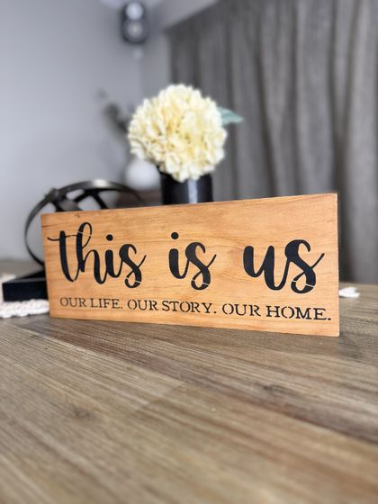 Wooden "this is us" sign