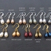 Simple Pearl earrings in silver: your choice of colour. Sterling silver hooks and teardrop Swarovski pearls