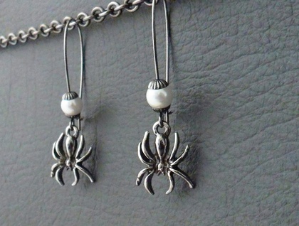 Spider Egg-Sac earrings: spider charms with white glass pearls on long ear-wires