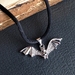 Chiroptera necklace: rhinestone-studded bat pendant on black satin cord