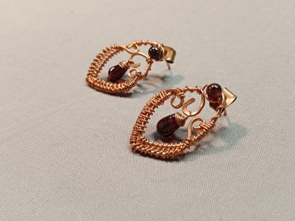 Lovely wire wrapped copper studs with garnet 