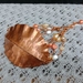 Fold formed leaf bracelet with pearls