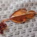 Fold formed leaf shawl pin with garnet beads