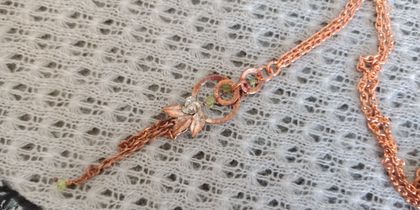 Hammered copper necklace with peridot