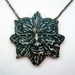 Green man necklace