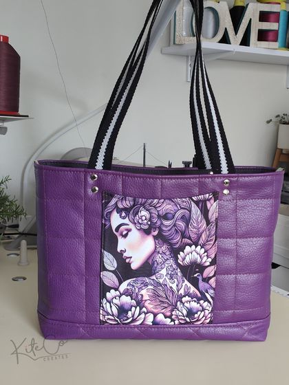 Purple tote with quilted vinyl perfect for the office