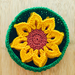 Crochet sunflower coasters with basket