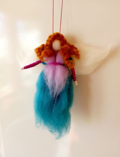 Auburn-haired woollen fairy 